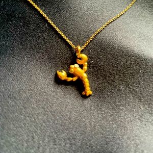 Tiffany & Co 18k solid yellow gold lobster charm with diamond eyes.